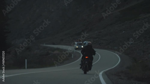 Couple of Motorcyclists are Driving along a Beautiful Country Serpantine Road