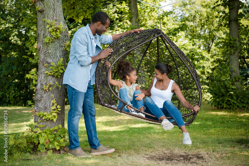 african american family on swing