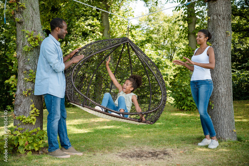 african american family on swing