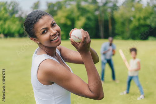 Photography african american woman with baseball ball