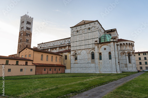 Romanesque Facade and bell tower of St. Martin Cathedral in Lucca, Tuscany. It contains most precious relic in Lucca, Holy Face of Lucca (Italian: Volto Santo di Lucca)