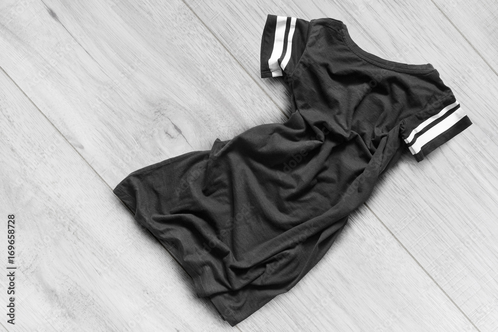 Shirt on wooden floor Shirt on wooden floor