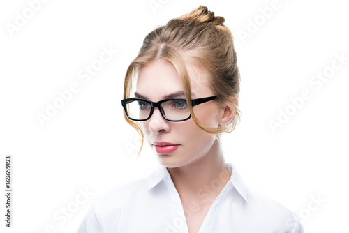 confident businesswoman in eyeglasses