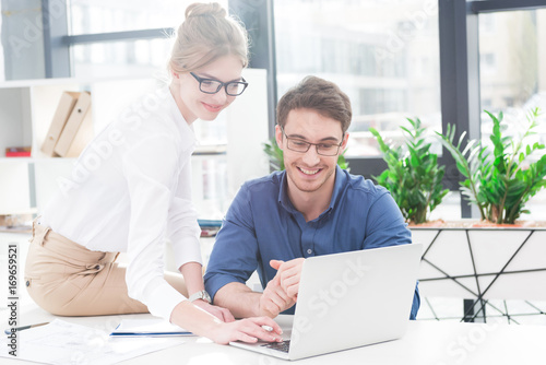 businesspeople working with laptop