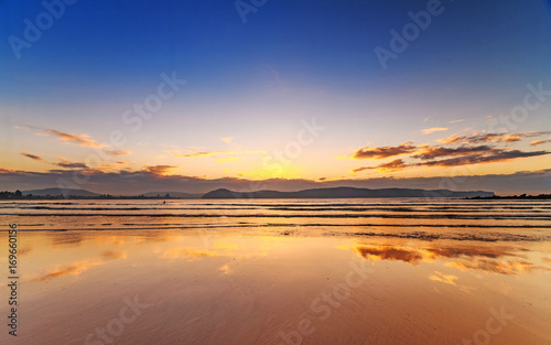 Sunrise Seascape and Cloud Reflections
