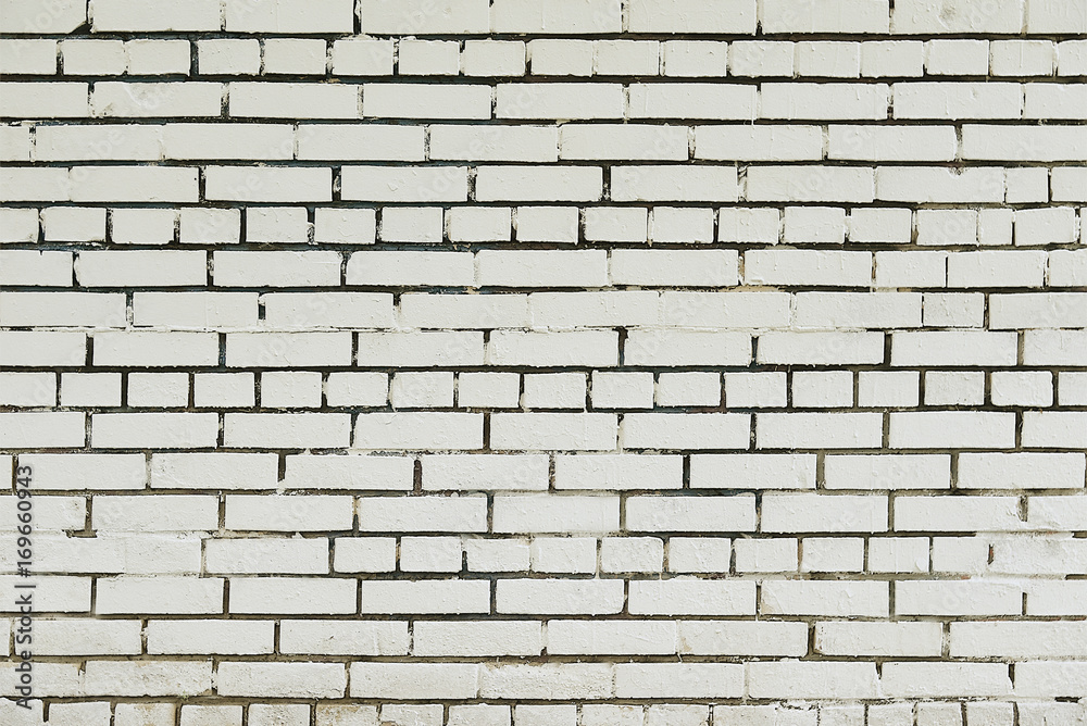 Fototapeta premium Old white brick wall background texture