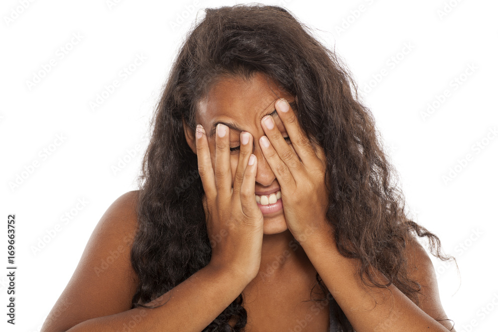 ashamed dark skinned beautiful girl on white background ashamed dark skinned beautiful girl on white background