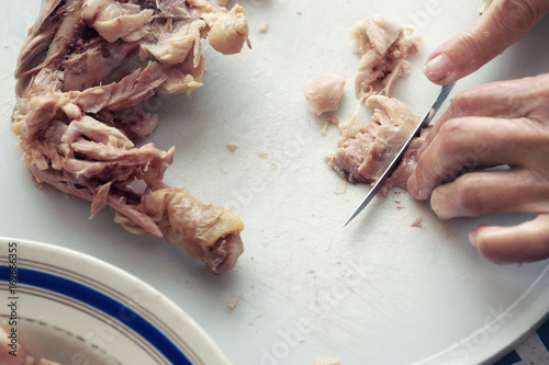 Fényképezés Cook Chopping Chicken Meat