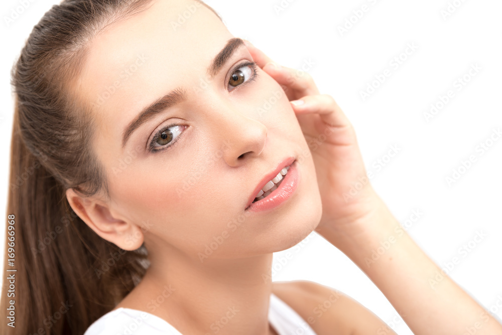 Natural Beauty Portrait. Beautiful Spa Woman . Perfect Fresh Skin.Portrait of the young caucasian beautiful girl , isolated on white background Natural Beauty Portrait. Beautiful Spa Woman . Perfect Fresh Skin.Portrait of the young caucasian beautiful girl , isolated on white background