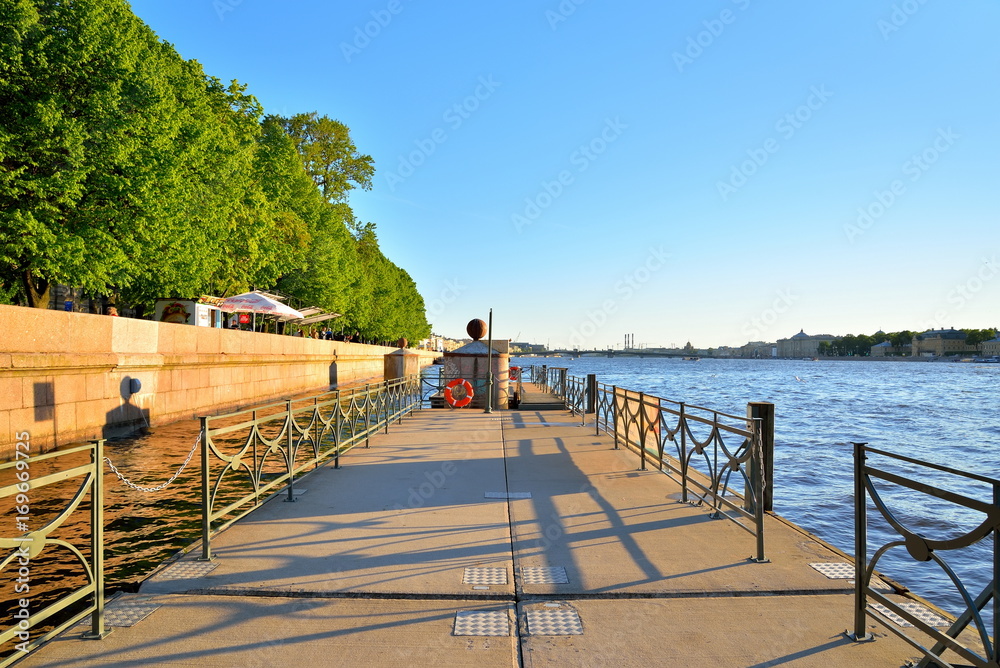 Floating dock on the Neva river at the Admiralty embankment in Saint-Petersburg