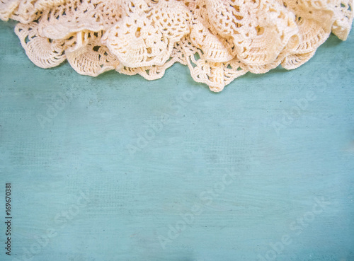Fototapeta Naklejka Na Ścianę i Meble -  Wooden background with woven lace in vintage style
