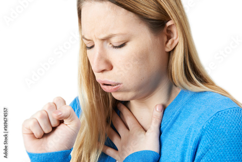 Young Woman Suffering With Cough