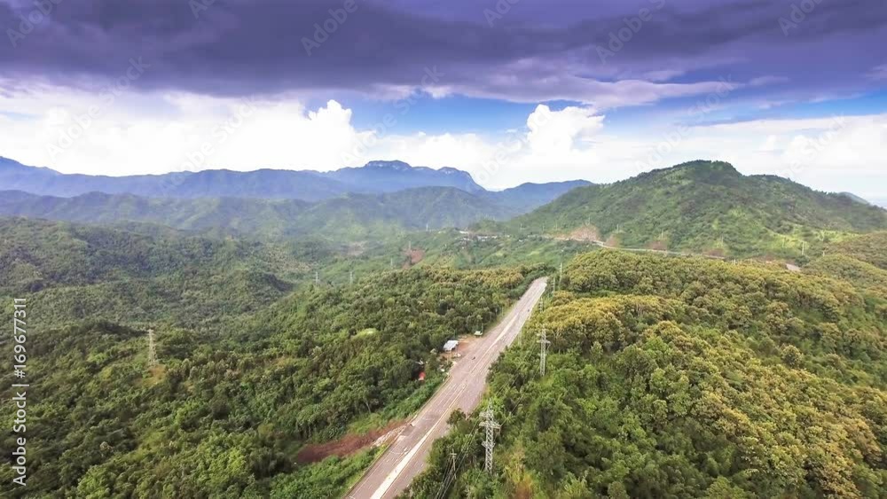 Aerial Views: Traveling on the highways with beautiful mountains and forests in Northern Thailand. Aerial Views: Traveling on the highways with beautiful mountains and forests in Northern Thailand.