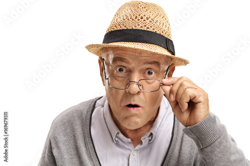 Slika na platnu Surprised mature man looking at the camera