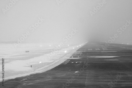 Foggy winter runway