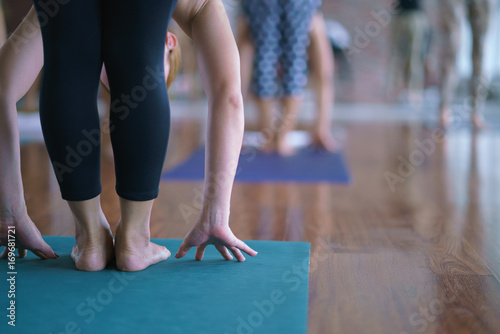 Group of girls to exercise, yoga in the studio