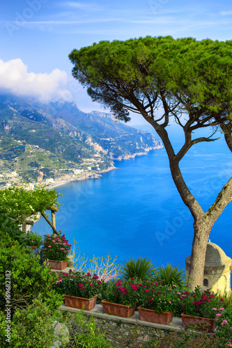 Picture-postcard view of famous Amalfi Coast with Gulf of Salerno from Villa Rufolo gardens in Ravello, Campania, Italy