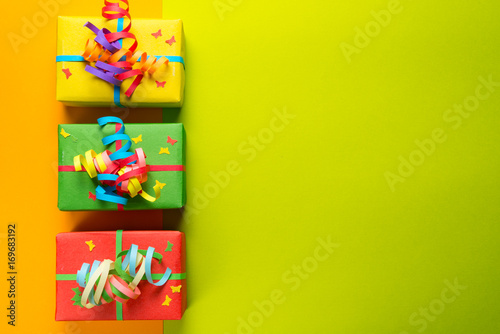 Gift boxes on colorful background