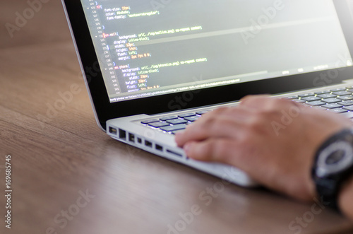 Man working on laptop in office