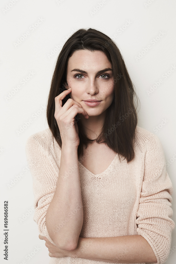 Beautiful brunette looking at camera, portrait Beautiful brunette looking at camera, portrait