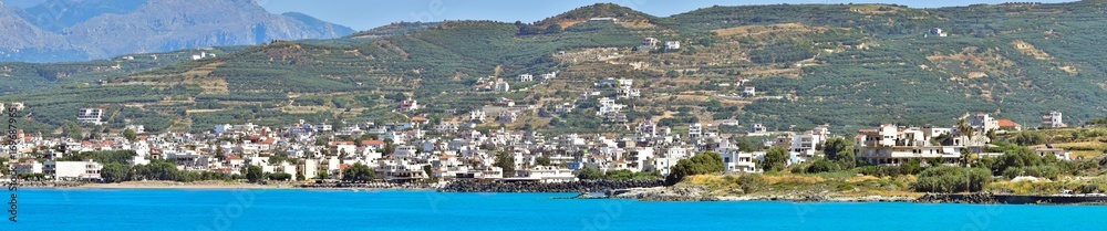 Panorama. The house on the slope of the shore. The Island Of Crete. Greece