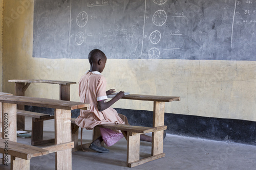 School girl studying in the classroom