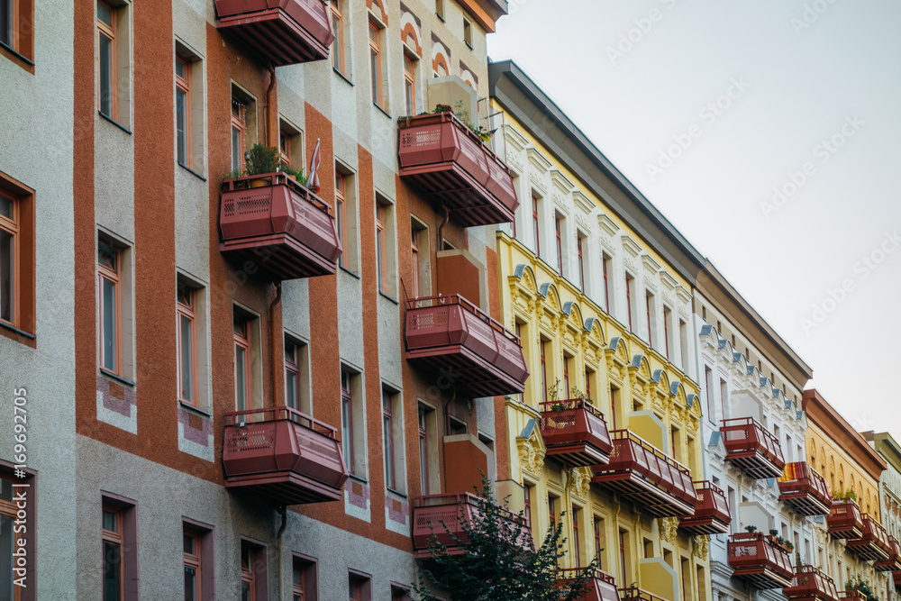 luxury row houses in berlin with red balcony