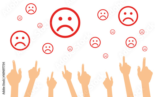 Hände zeigen auf traurige Smileys