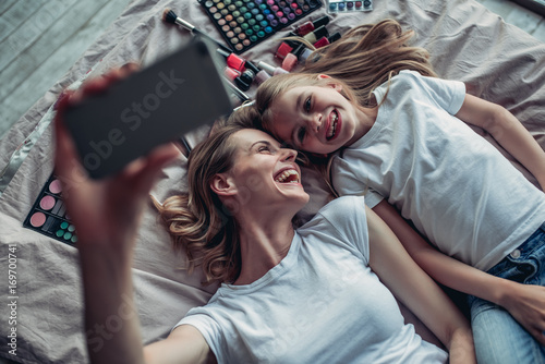 Mom with daughter doing makeup