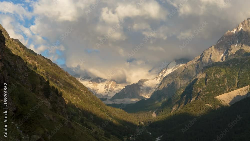 Russia, Republic of Kabardino-Balkaria, time lapse. Summer in the mountains of the Caucasus. Formation and movement of clouds over mountains peaks. Russia, Republic of Kabardino-Balkaria, time lapse. Summer in the mountains of the Caucasus. Formation and movement of clouds over mountains peaks.