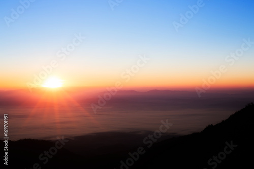 sun rise over a fog and mountain  in Thailand © byjeng