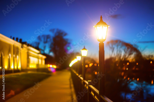 Close up shot of a street lamp at night