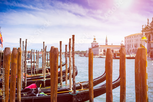 Amazing view on the beautiful Venice, Italy. Many gondolas sailing down one of the canals.