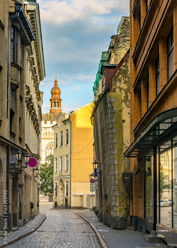 Morning in medieval street in old city of Riga, Latvia, Europe
