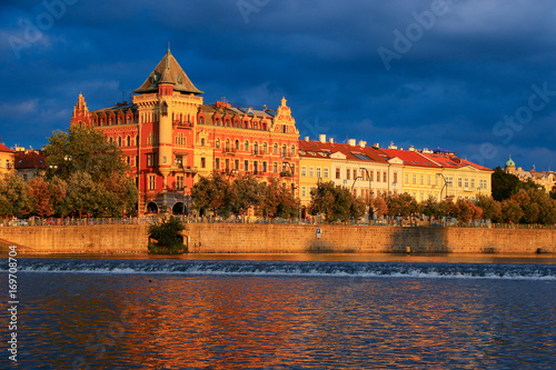 Reflections on the Vltava river at sunset in Prague city center © Alexandre ROSA