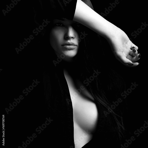 erotic beautiful woman in dark photo
