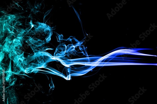 Abstract Light blue smoke on black background, Light blue background,Light blue ink background