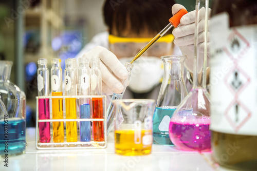 Asian scientists are experimenting with chemistry in the laboratory.