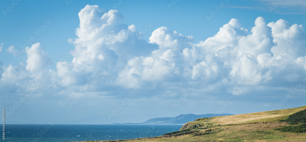 Beautiful Clouds over British Shore Line at Summer