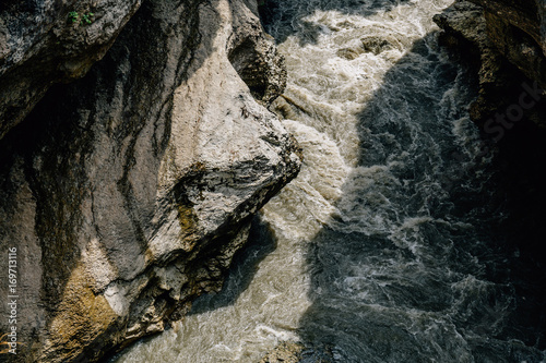 Top view of the mountain river among the rocks