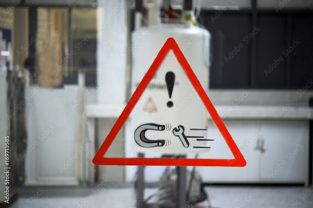 Safety symbol before entering the nuclear laboratory. Nuclear Magnetic Resonance Spectroscopy (NMR) Machine