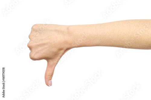 Woman's hand showing thumb down gesture