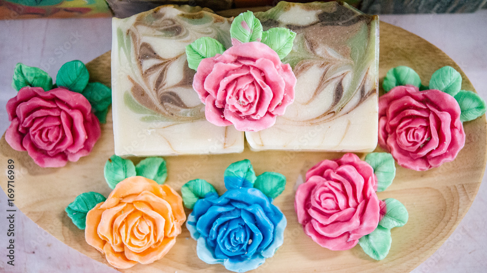 Handmade Soap with bath and spa accessories. Dried lavender and rose petals. Carve and draw a pattern on the soap. Handmade Soap with bath and spa accessories. Dried lavender and rose petals. Carve and draw a pattern on the soap.