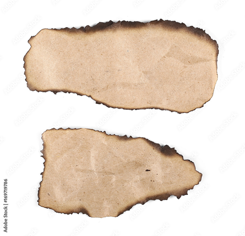 Burnt cardboard scraps isolated on white background Burnt cardboard scraps isolated on white background