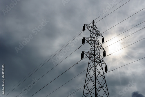 500 KV transmission line in maemoh lampang thailand. electricity transmission pylon with blue sky and cloud. photo