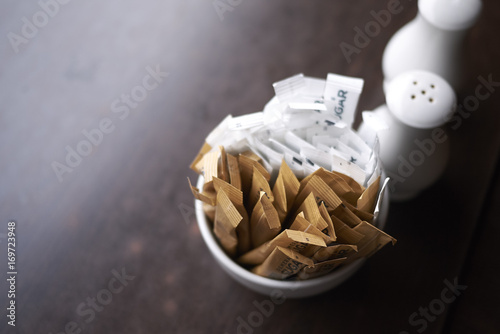 Sugar bags and seasoning photo