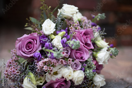 Gorgeous lilac bridal bouquet outdoors