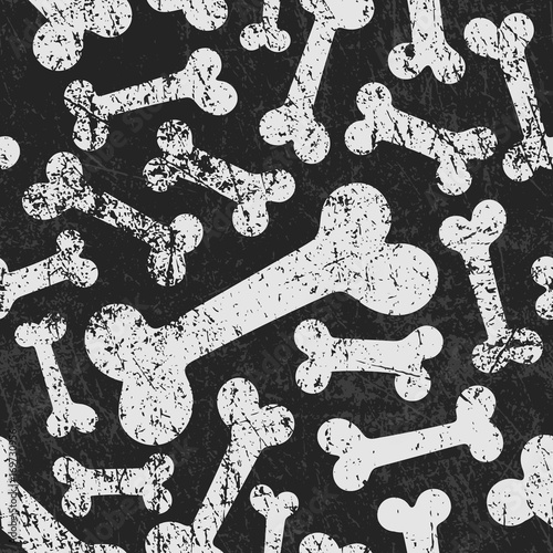 Vector seamless halloween pattern with bones. Grunge style, shabby street art imitation. Vintage old paper texture.