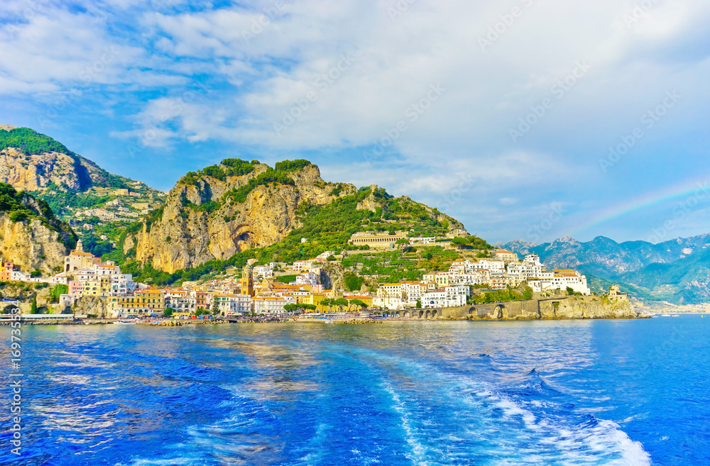 View of Amalfi village on a sunny day along Amalfi Coast in Italy.
