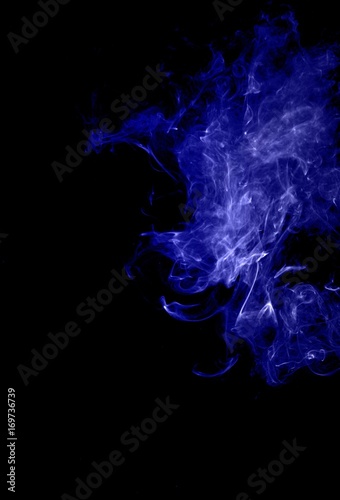Abstract blue smoke on black background,blue ink background